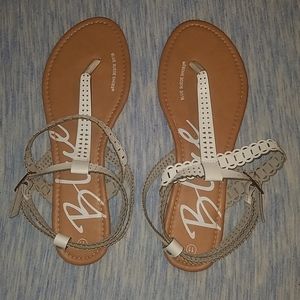 White laser cut sandals